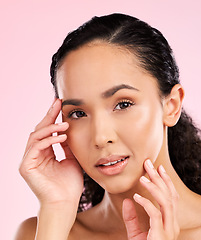 Image showing Beauty, cosmetics and portrait of woman in studio for wellness, facial treatment and skincare. Dermatology, spa aesthetic and female person with healthy skin, glow and natural face on pink background