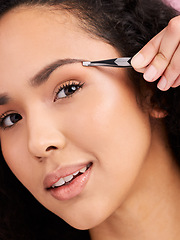 Image showing Face, closeup and woman with tweezer for eyebrow, beauty and grooming for skincare. Natural portrait, facial plucking and hair removal of model for self care, wellness or aesthetic for cosmetics.