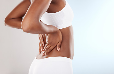 Image showing Back, hands and body of model in lingerie isolated on a white background in studio. Beauty, skincare and person with underwear for wellness, health and natural with slim aesthetic on mockup space