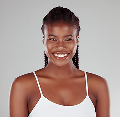 Image showing Beauty, health and smile with portrait of black woman in studio for skincare, wellness or dermatology. Self care, cosmetics and happy with female model on gray background for glow, natural and makeup