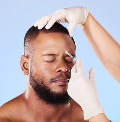 Image showing Black man, plastic surgery and syringe in studio for beauty, anti-aging or facial transformation by background. African patient, model and medic hands for dermatology, needle or fillers for aesthetic