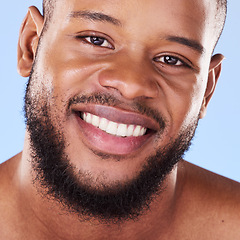 Image showing Cosmetics, closeup and black man with skincare, dermatology and grooming against a blue studio background. Male person, beard or model with treatment, face and glow with aesthetic, self care or smile