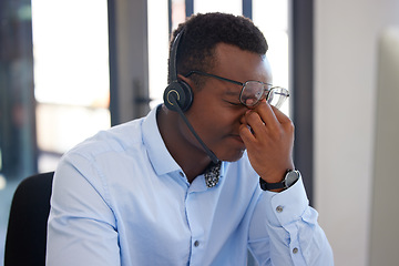 Image showing Customer support, call center burnout or black man stress over communication mistake, networking problem or anxiety. Fatigue, tired or African insurance agent, person or consultant with headache pain