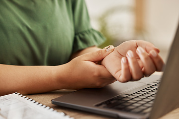 Image showing Closeup, laptop and woman with wrist pain, injury and overworked by desk, sprain hand or joint. Female person, entrepreneur or freelancer with a pc, carpal tunnel syndrome or ache with muscle tension