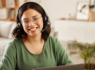 Image showing Remote work, portrait and woman for online meeting at home with laptop and online job. Headphones, female person and computer in a house with a smile from digital web blogger at desk in living room