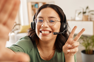 Image showing Woman, call center and selfie with peace sign, happy and post with work from home office, headphones and mic. Influencer girl, telemarketing agent or crm for memory, social network or profile picture