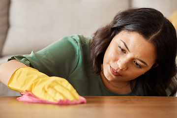 Image showing Home, furniture and woman cleaning, cloth and housekeeping with dust, bacteria and hygiene. Female person, cleaner and lady wiping the table, chores and disinfection with tidy household and fresh