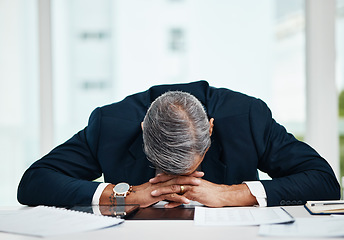 Image showing Burnout, professional and senior man sleeping at desk with tech or problem with fatigue in office. Tired, stress and senior male person asleep on table with insomnia at workplace at workplace.