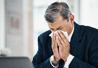 Image showing Sick, mature man and blowing nose in office with allergy, covid or virus in business company. Tissue paper, professional or manager with allergies for health problem, cold fever or bacteria in winter