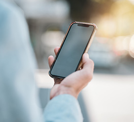 Image showing Hands, closeup and a person with a phone in the city for social media, gps location and notification. Screen, website and an employee with a mobile for a direction app, morning news or email