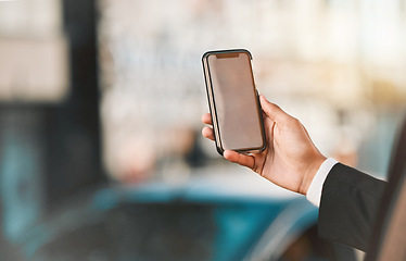 Image showing Closeup, business and man with a smartphone, city and connection with social media, travel and mockup. Location, person or professional with a cellphone, mobile application and outdoor with network