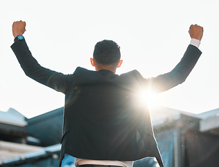 Image showing Back, win and a businessman with success in city for a corporate win, achievement or celebration. Sunshine, motivation and an excited employee with freedom from work, promotion or professional bonus