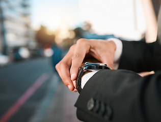 Image showing Hands, watch and time with business man in street, road with calendar date, schedule and notification. Entrepreneur, iot clock and check for reminder, closeup and outdoor in city, cbd or metro street