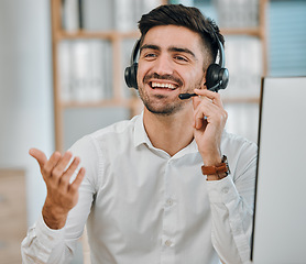 Image showing Telemarketing, communication and man in call center for customer service, lead generation or CRM agent. Happy salesman, consultant and contact on microphone of telecom, advisory help or FAQ questions