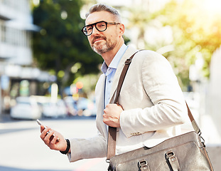 Image showing Business, travel and man with phone in a city street for location, search or guide outdoor. Smartphone, trip and male manager online for traveling app, directions or navigation on morning commute