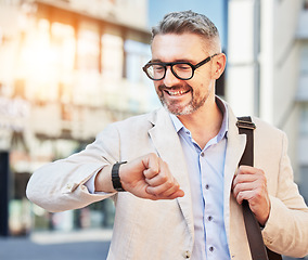 Image showing City, mature businessman and checking time for travel, morning commute or appointment. Professional, corporate and an employee or manager with a watch to be early or late for work with a smile