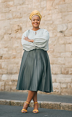 Image showing Portrait, happy and city with a business black woman standing arms crossed outdoor for management. Leadership, mindset and smile with a confident female CEO, manager or boss in an urban town