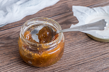 Image showing Glass jar full of fig jam 