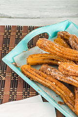 Image showing Traditional churros with hot chocolate 