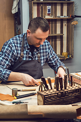 Image showing Concept of handmade craft production of leather goods.