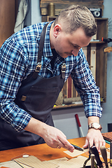 Image showing Concept of handmade craft production of leather goods.