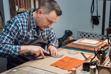 Image showing Concept of handmade craft production of leather goods.