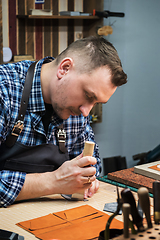 Image showing Concept of handmade craft production of leather goods.