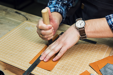 Image showing Concept of handmade craft production of leather goods.