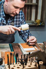 Image showing Concept of handmade craft production of leather goods.