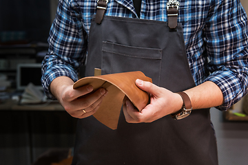 Image showing Concept of handmade craft production of leather goods.