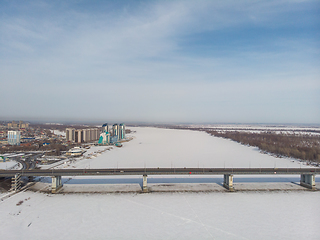 Image showing Aerial shot of bridge and car driving on the bridge