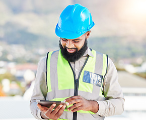 Image showing Black man, architect and tablet in city for construction planning, maintenance or building on rooftop. African male person, engineer or contractor working on technology for architecture plan on site