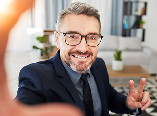 Image showing Hands, peace and business man selfie in office for profile picture, photo or break. Portrait, happy and guy ceo influencer pose for podcast, blog or social media post at work with content creation