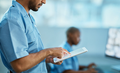 Image showing Man, hands and security guard on tablet for surveillance, search or browsing at the office. Male person, law enforcement or officer working on technology for emergency check or safety inspection