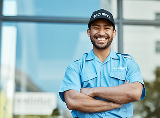 Image showing Happy man, portrait and security guard with arms crossed in city for career safety or outdoor protection. Male person, police or officer smile in confidence, law enforcement or patrol in urban town