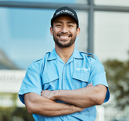 Image showing Asian man, portrait and security guard with arms crossed in city for career safety or outdoor protection. Male person, police or officer smile in confidence, law enforcement or patrol in urban town