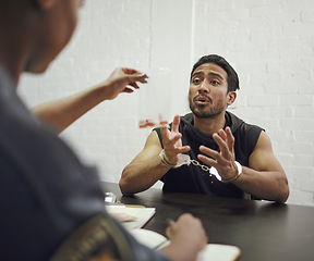 Image showing Man, criminal and handcuffs for interrogation, drugs or crime in arrest with police officer in room. Male person, gangster or suspect in jail, justice or guilty for fraud, theft or illegal substance