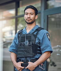 Image showing Security, police and portrait of man in city for justice, inspection and supervision on patrol. Surveillance, law enforcement uniform and male person in town for safety, crime and protection service