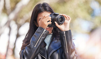 Image showing Photography camera, shooting and city woman, tourist or photographer with creative memory picture, photoshoot or production. Lens, urban street and outdoor person with DSLR for artistic vision shot