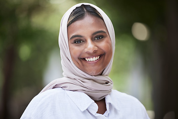 Image showing Nature, happy and portrait of Muslim woman in park for holiday, freedom and relaxing outdoors. Happiness, smile and face of Islamic female person with joy, confidence and positive mindset with hijab