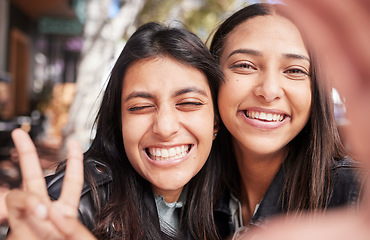 Image showing Face, friends and selfie in city with peace sign, smile and bonding together outdoor for travel. Portrait, profile picture and girls or women with photography for happy memory, social media or v hand