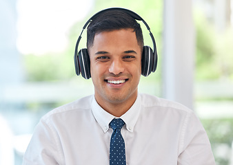 Image showing Portrait, headphones and smile of business man in office for music, sound and consulting on video call. Face of happy male consultant listening to podcast, streaming radio and audio while working