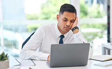 Image showing Bored, tired and business man at laptop in office with stress, anxiety or burnout for tax audit. Lazy, sad and frustrated employee working at computer with challenge, problem or fatigue of boring job