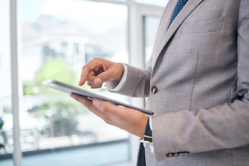 Image showing Hands, tablet and professional man with research in office for project management for career. Closeup, typing and online app with business person in company for communication on email or website.