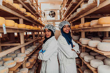 Image showing Arab business partner visiting a cheese factory. The concept of investing in small businesses