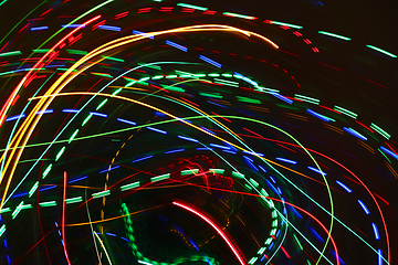 Image showing Abstract colorful motion background with blurred lights