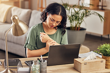 Image showing Wrist pain, stress and laptop with woman in home office for injury, emergency and accident. Burnout, muscle and tension with female employee and arm massage for carpal tunnel, joint and inflammation