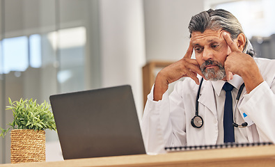 Image showing Senior doctor man, laptop and headache with stress, 404 glitch or connectivity problem in hospital office. Mature medic, pc and reading bad results for thinking, anxiety and fear in healthcare job