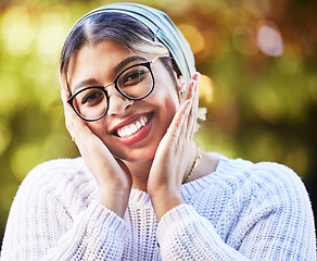 Image showing Portrait, smile and girl in outdoor or nature with glasses in summer with beauty or freedom. Nerd, happy and face with student at park with peace or positive mindset for fashion with turban scarf.