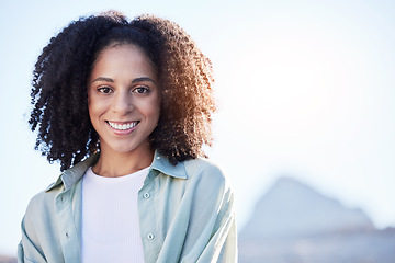 Image showing Happy, summer and portrait of a woman in the city for sun, smile and vacation with mockup. Travel, morning and headshot of a young girl with space for advertising on bokeh on a urban holiday